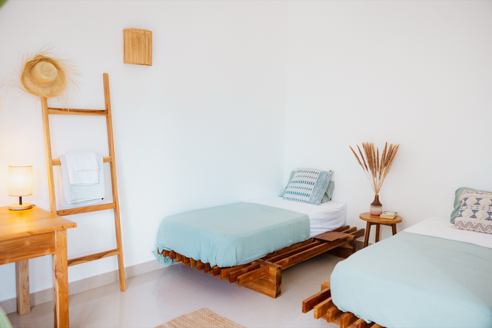 Twin beds with handmade teak frames